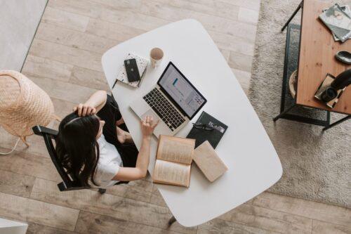 Desk being used for business.